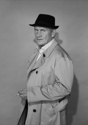 Joachim Paul Assboeck in coat with head